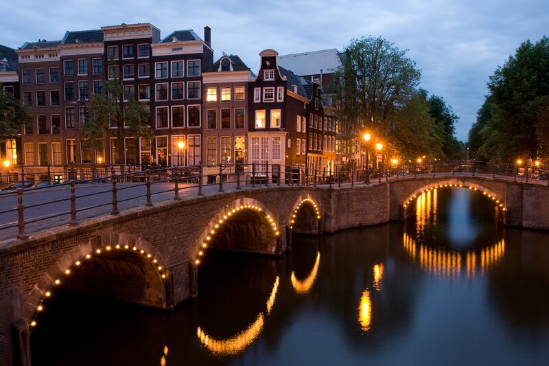 canal bridge at dusk in Amsterdam