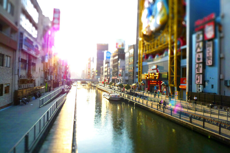 canal in a city at sunset