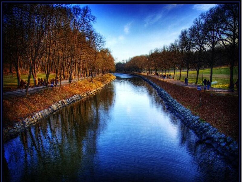 Canal in a park at sunset