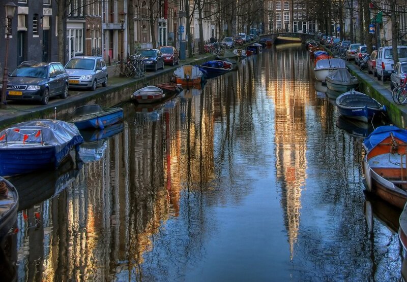 canal in amsterdam at sunset