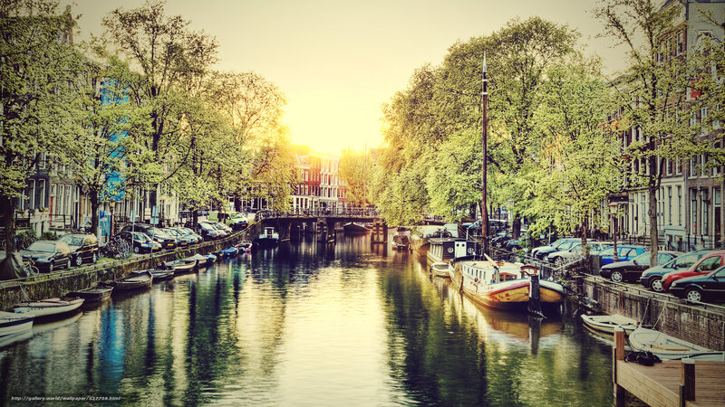 canal in amsterdam at sunset