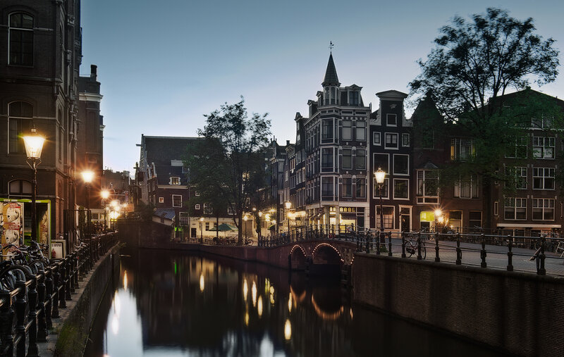 Canal in Amsterdam — Blue, Serene, Night, Photograph, Buildings