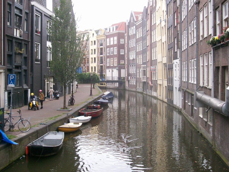 canal in amsterdam with boats