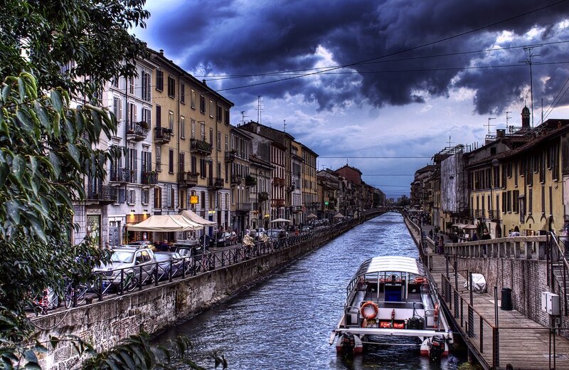 Canal in Milan under stormy sky