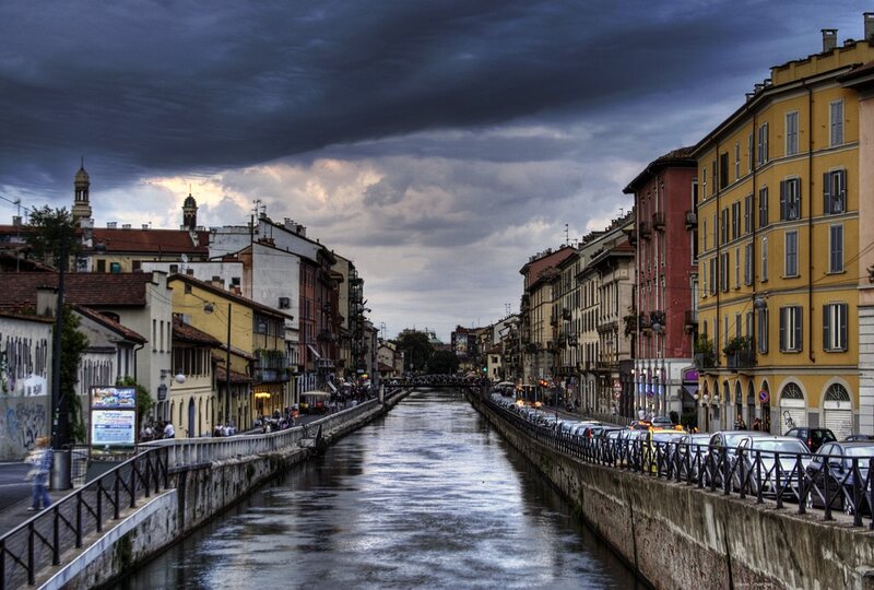 Canal in Milan under stormy sky