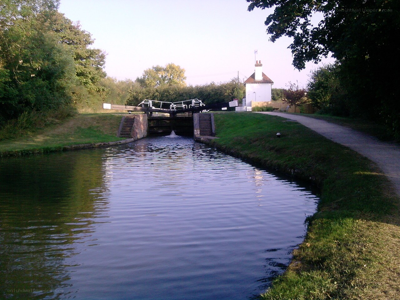 canal lock with house in background