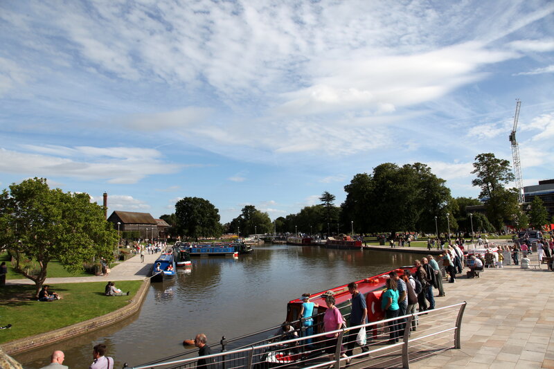 Canal scene with boats and people