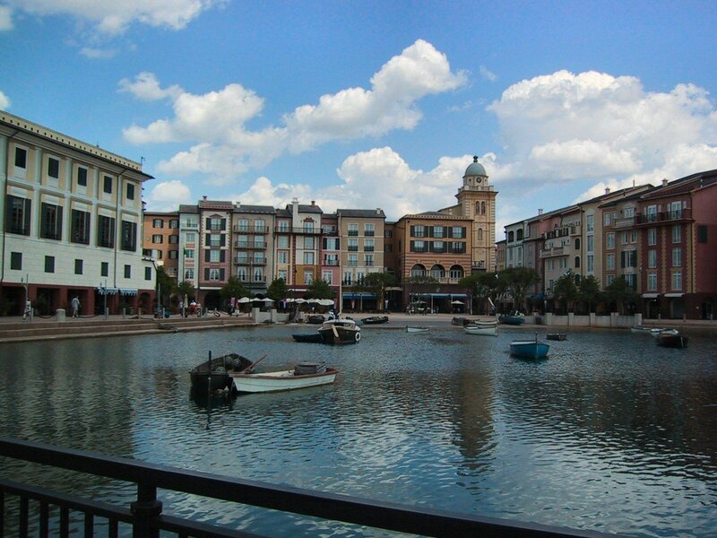 canal town with boats and buildings