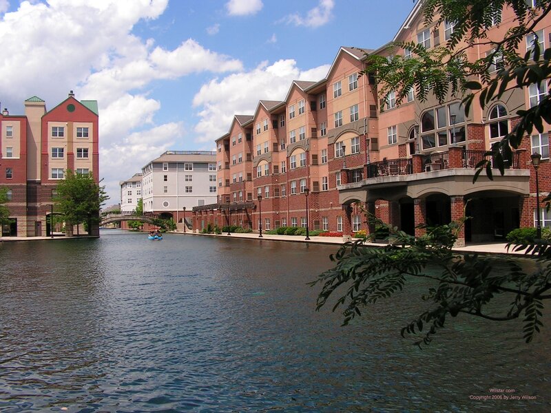 canal with apartment buildings