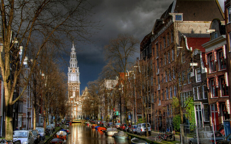 Canal with Boats and Tower
