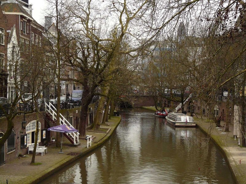 Canal with Boats and Trees — Brown, Calm
