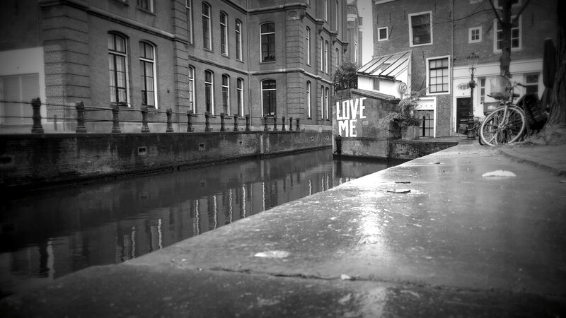 Canal with Brick Buildings — Black