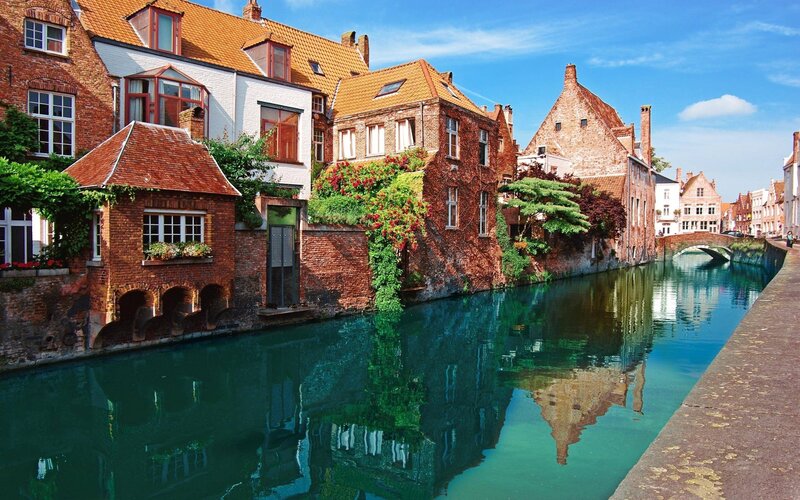 Canal with Brick Buildings — Blue, Serene