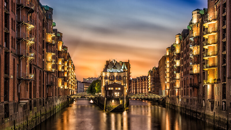 Canal with Brick Buildings — Orange, Serene