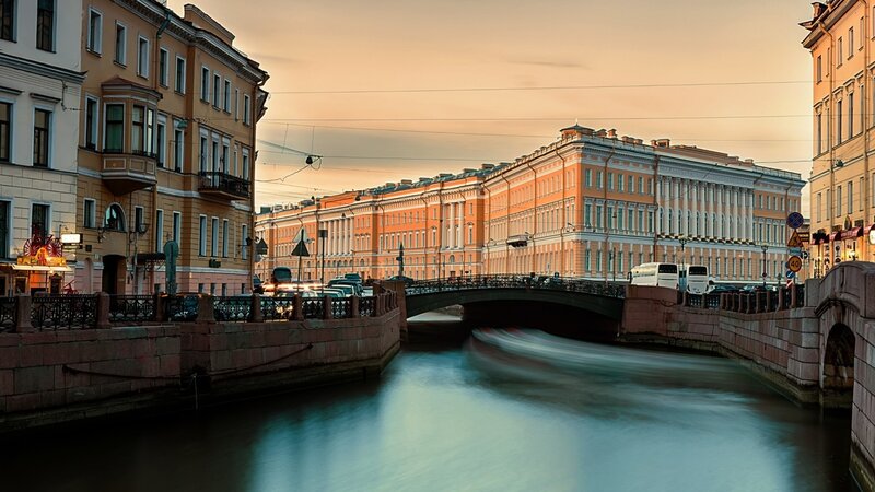Canal with Bridge and Buildings — Orange