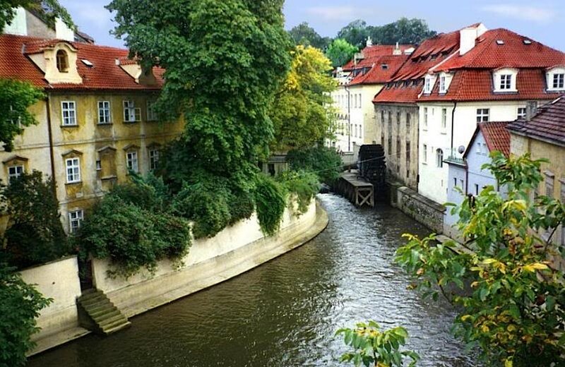 Canal with Buildings — Green