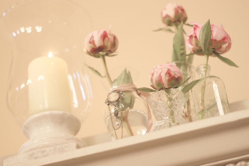 Candle and Flowers on Mantel