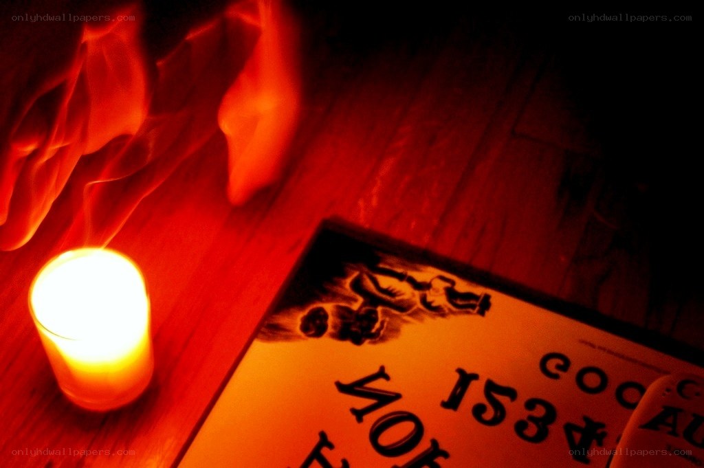 candle and ouija board