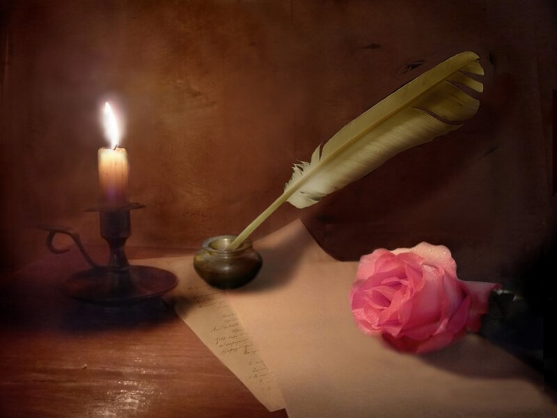 Candle and Quill on Table