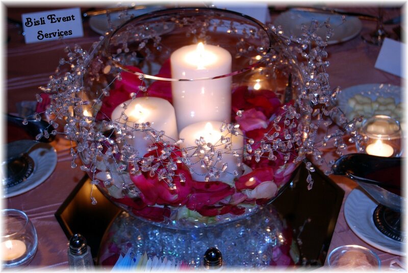 candle centerpiece with rose petals