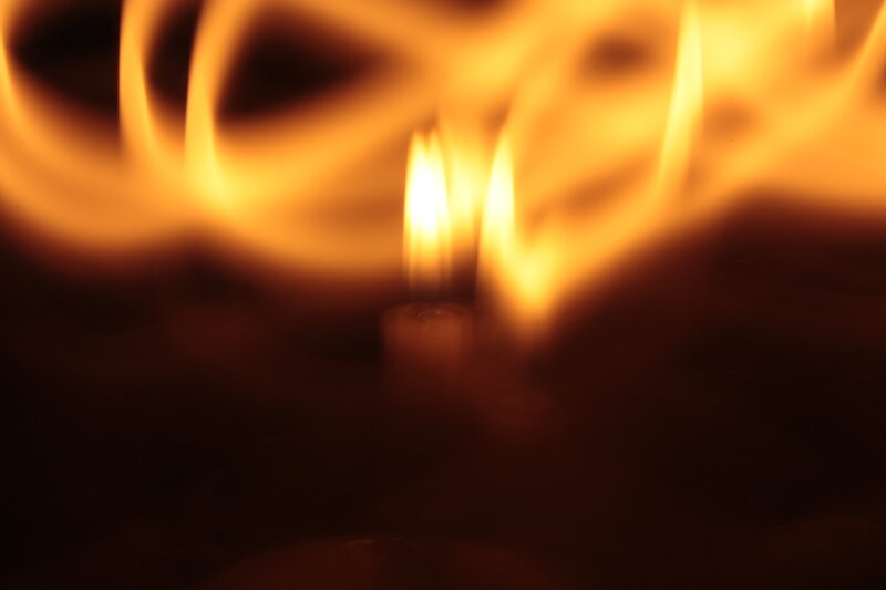Candle Flame in Darkness — Orange