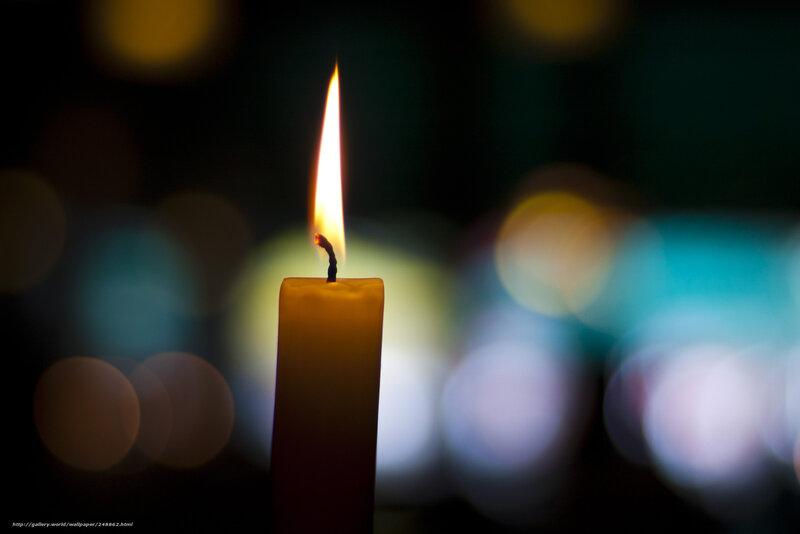 Candle flame in darkness