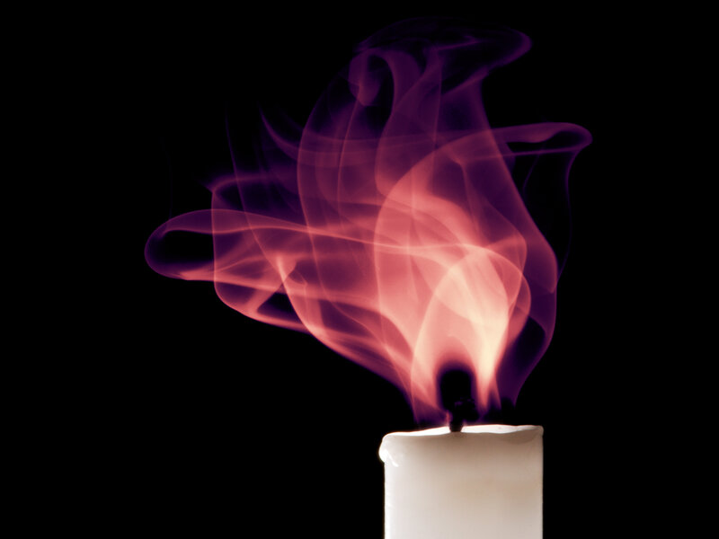 Candle flame with smoke