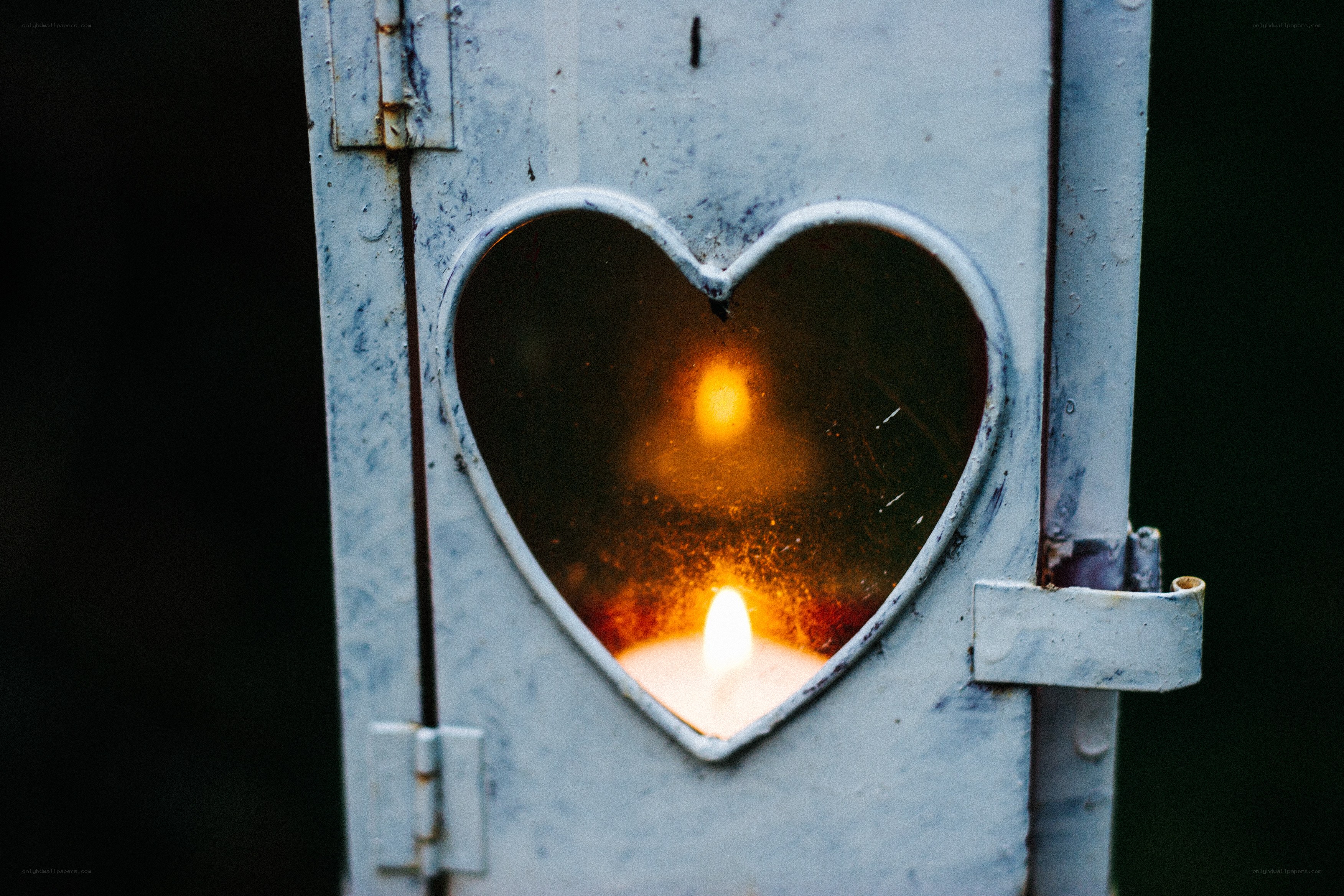 Candle in a heart-shaped lantern