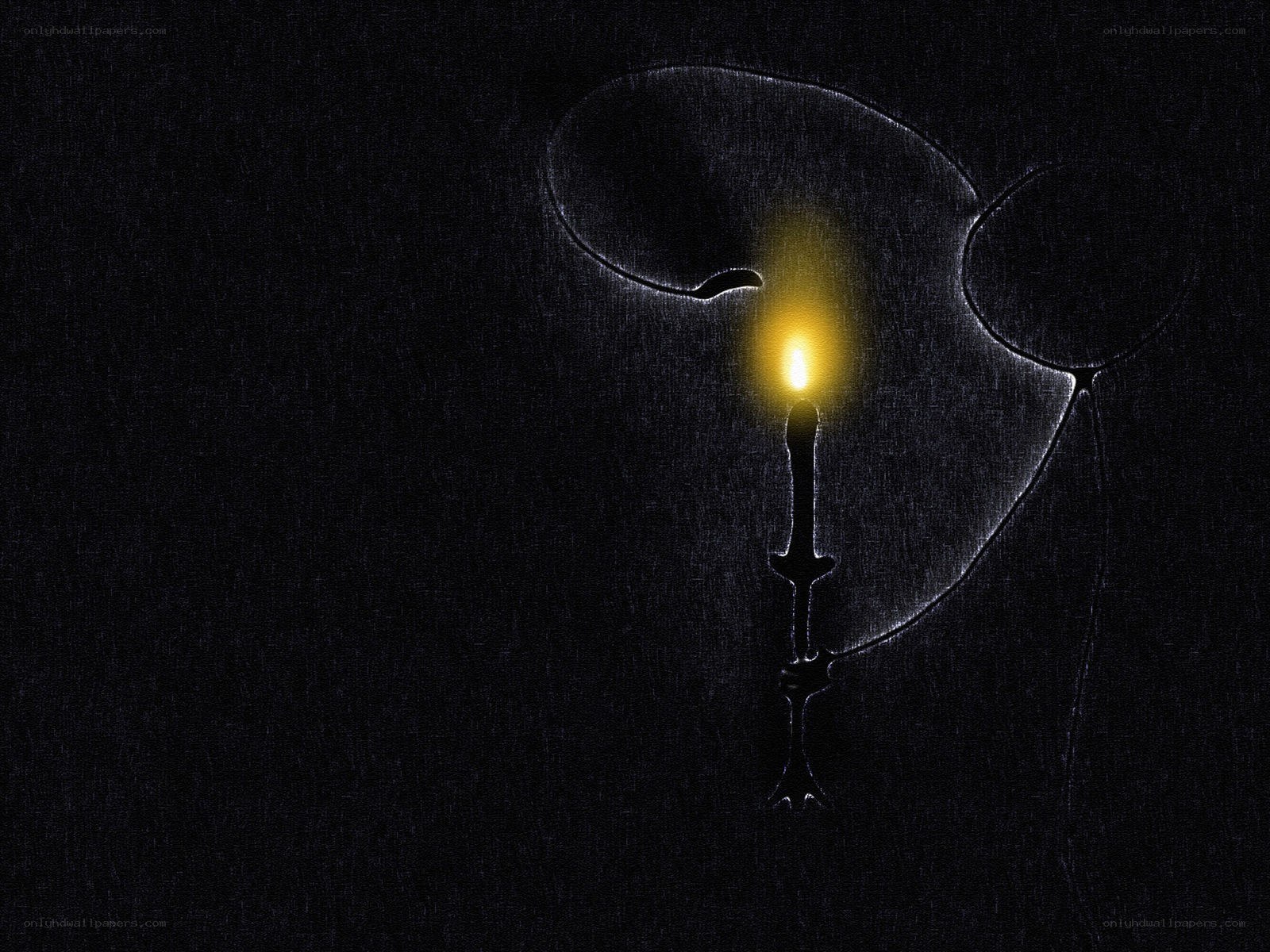 candle in dark silhouette