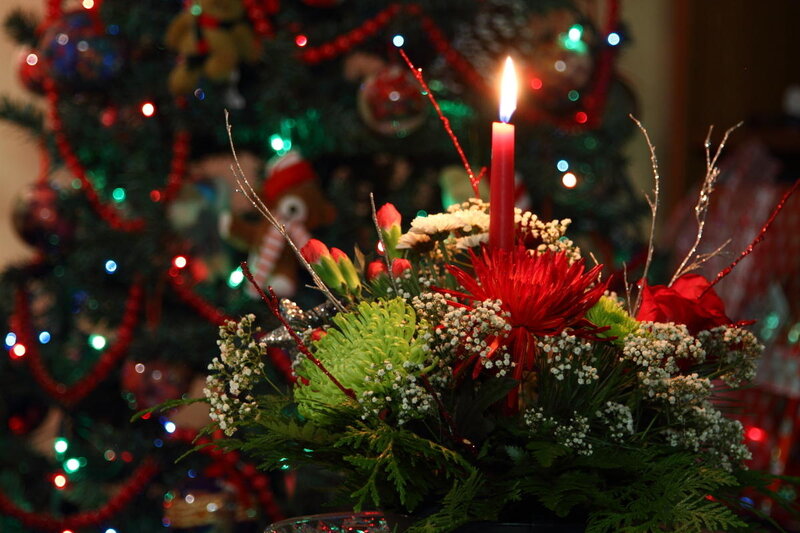 Candle in Floral Arrangement — Red