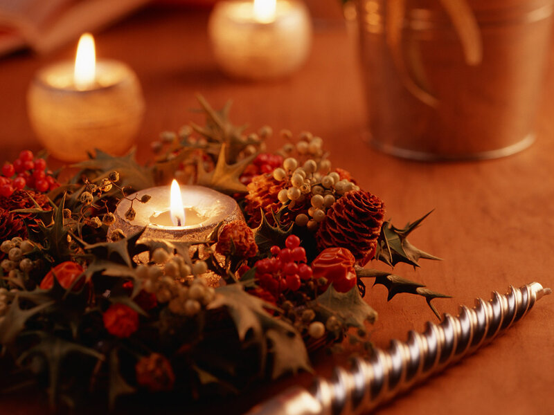 Candle in Floral Arrangement