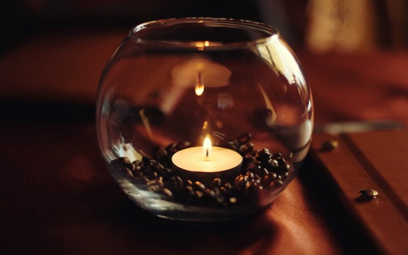 candle in glass bowl