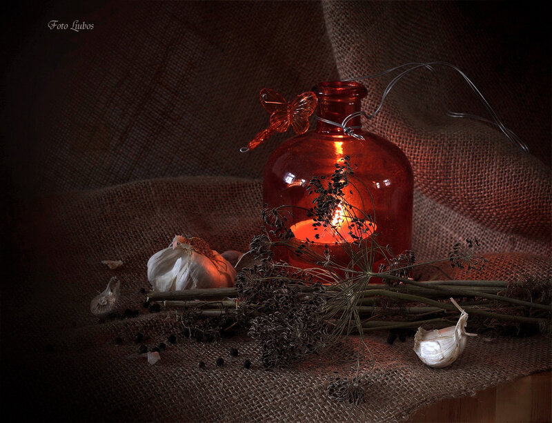 Candle in Red Bottle