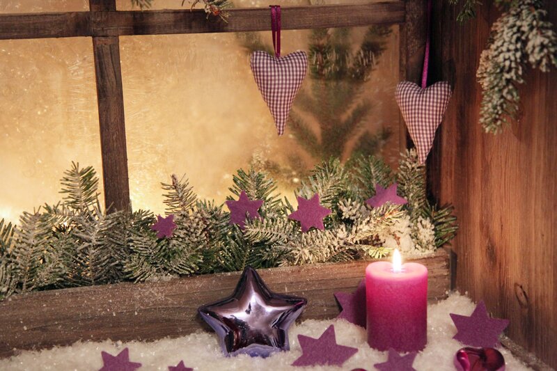 Candle in Winter Display