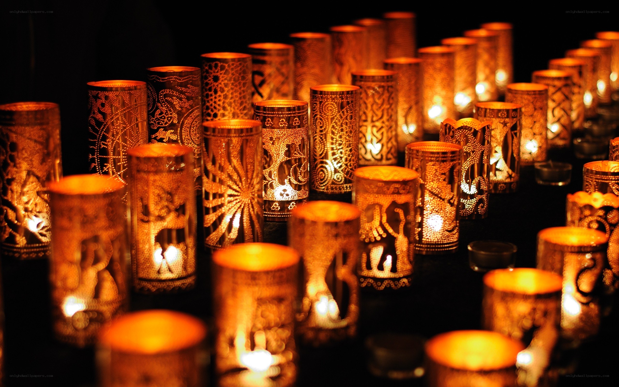 Candle lanterns with intricate designs