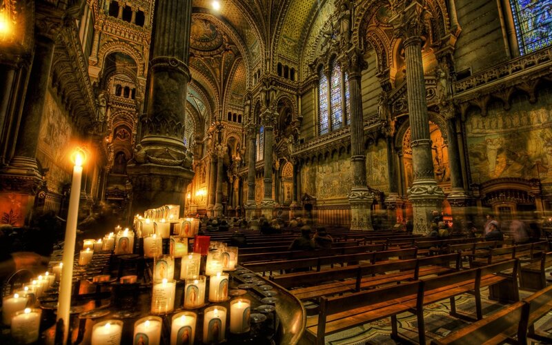 Candle-lit cathedral interior