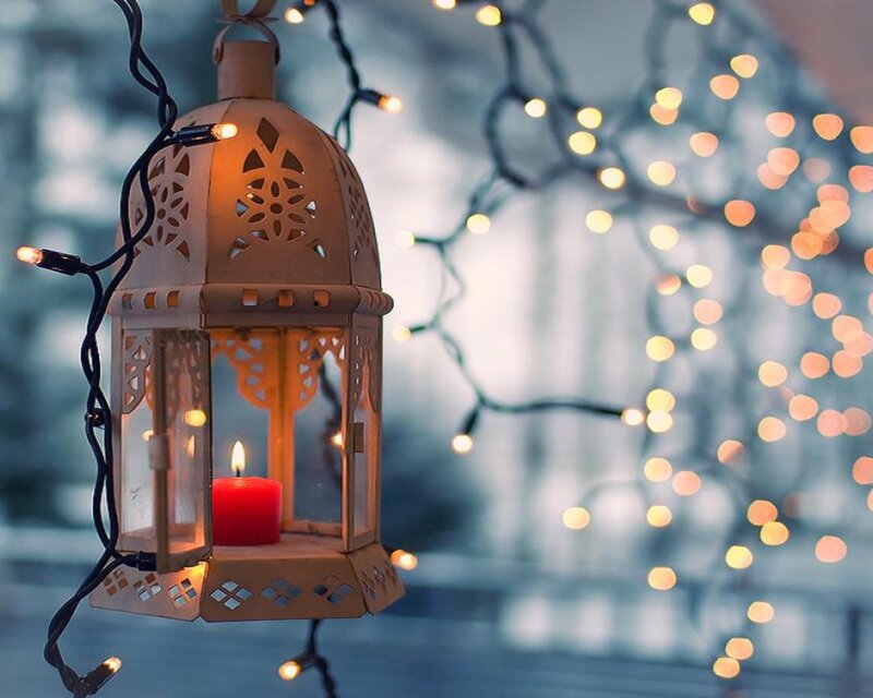 Candle-lit lantern with fairy lights