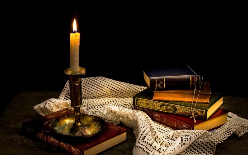 Candle on Books