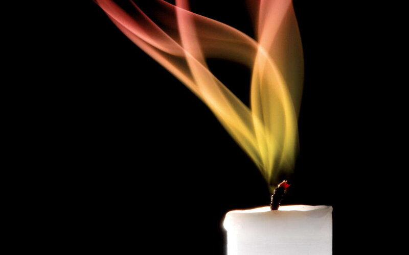 candle smoke against black