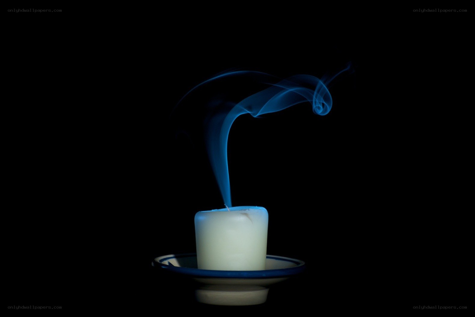 candle with blue smoke