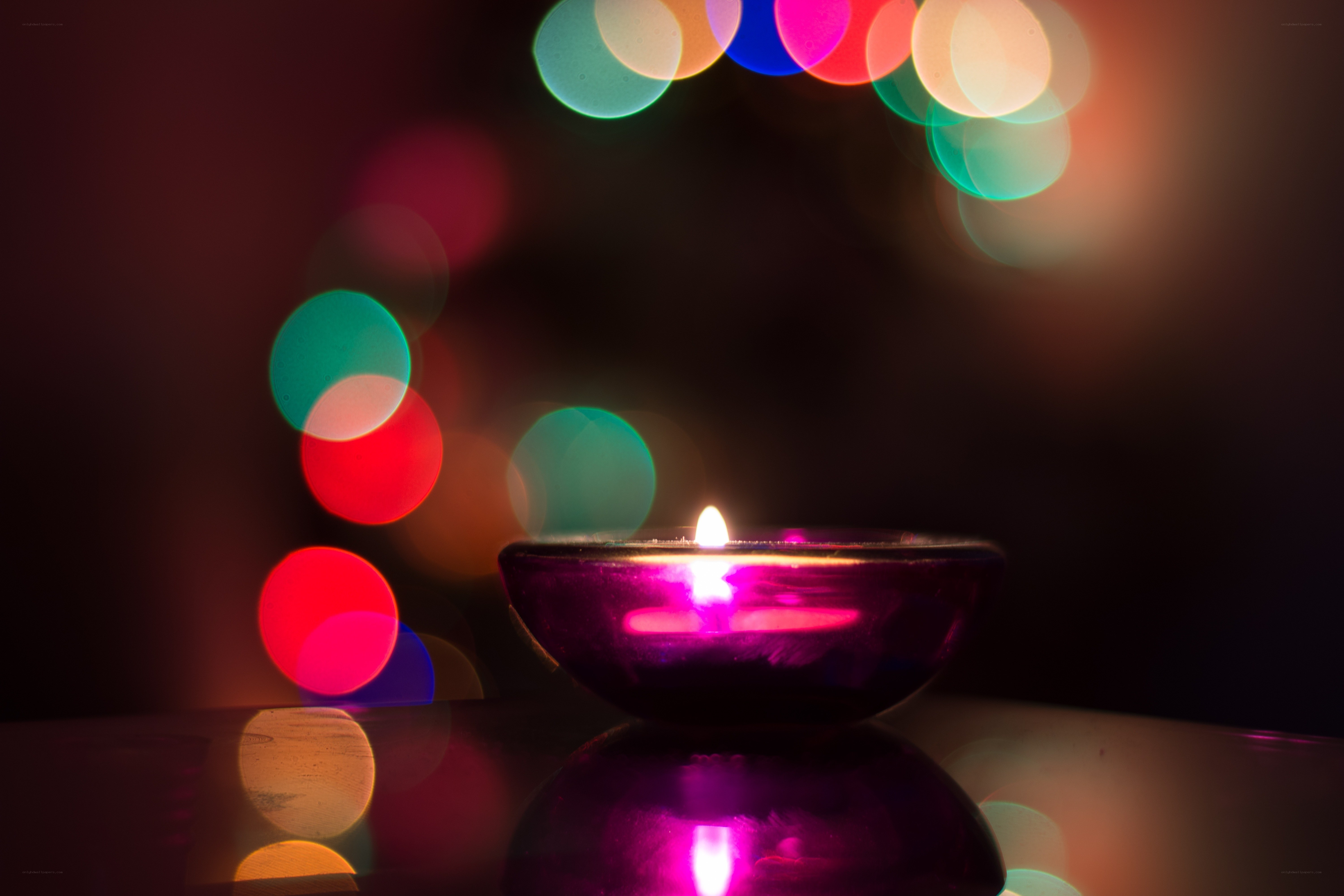 Candle with colorful lights