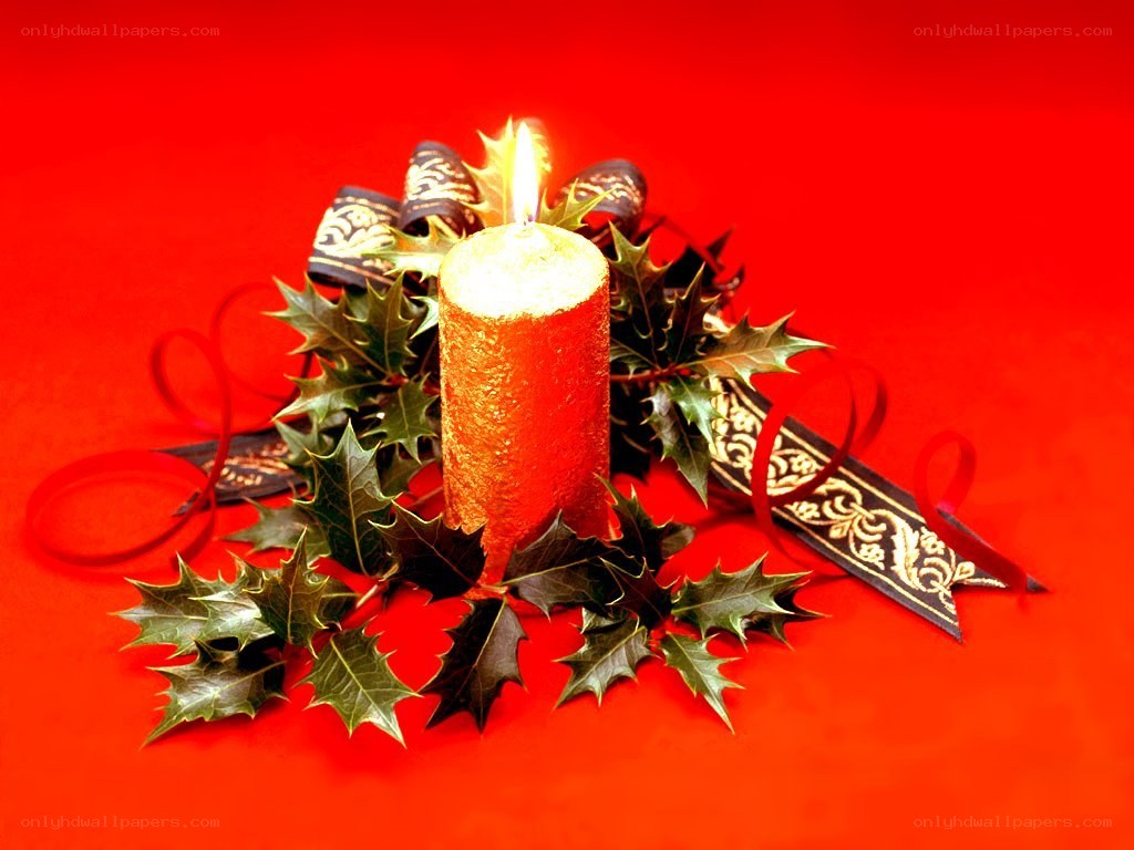 candle with holly wreath