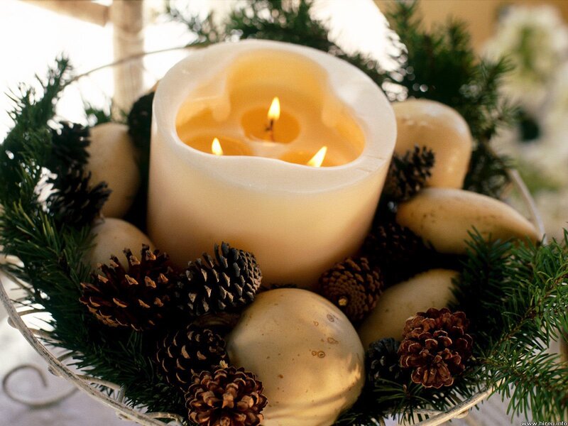 candle with pine cones