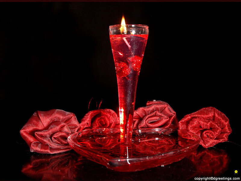 Candle with red roses