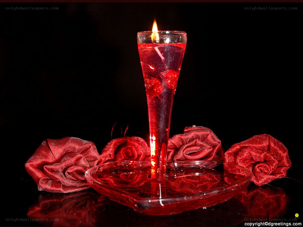 Candle with red roses