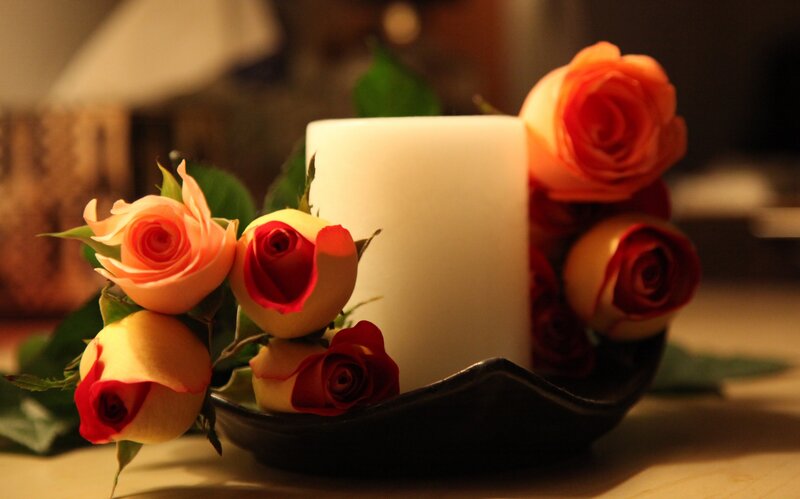 candle with roses centerpiece