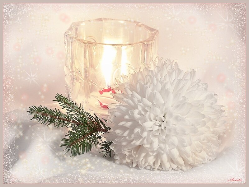 Candle with white flower