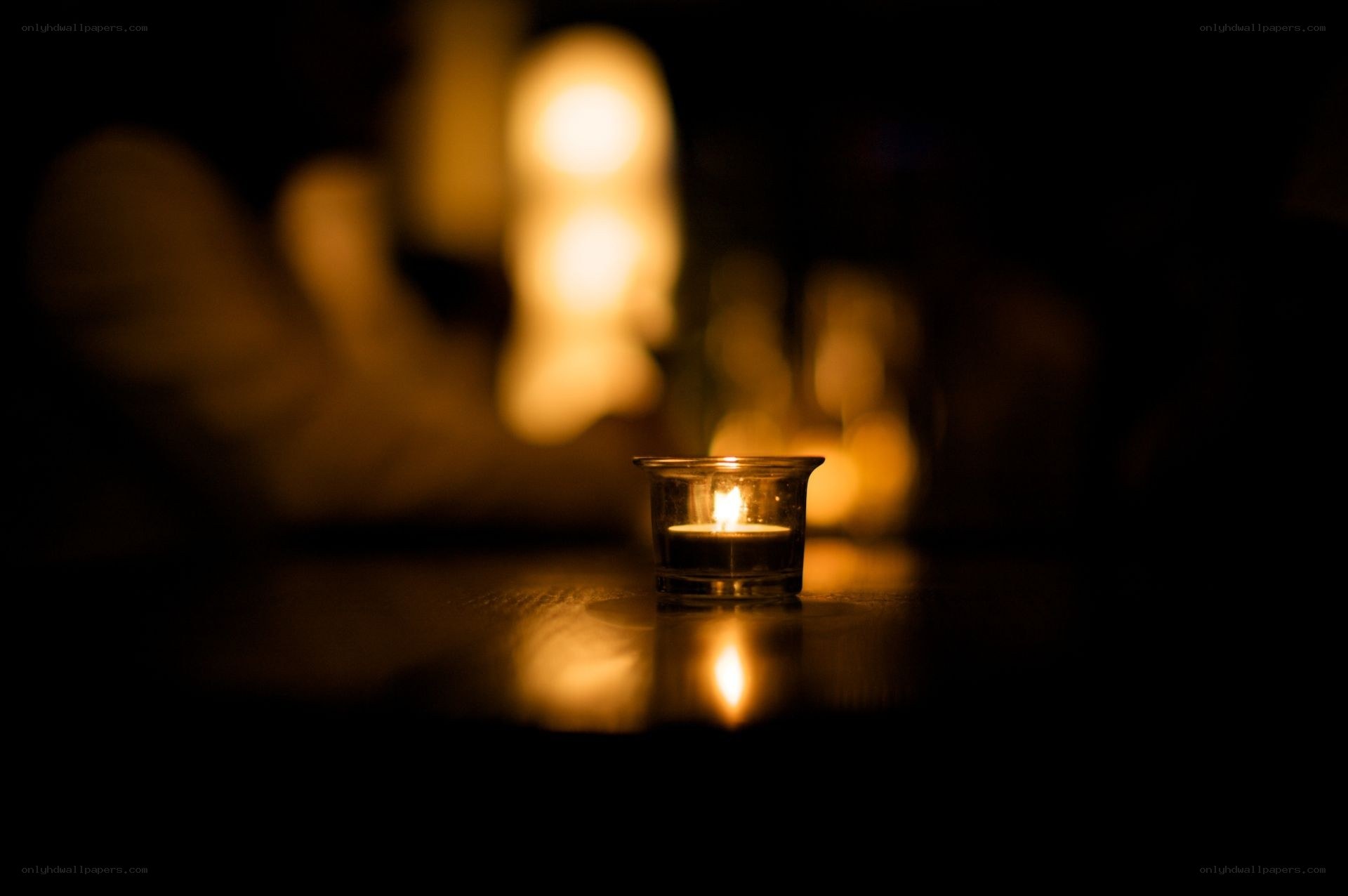 Candlelight in a dark room