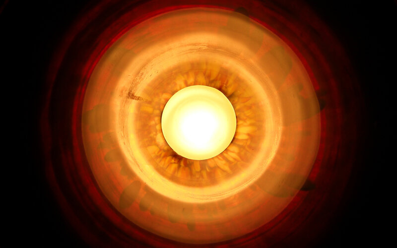 candlelight in a glass holder