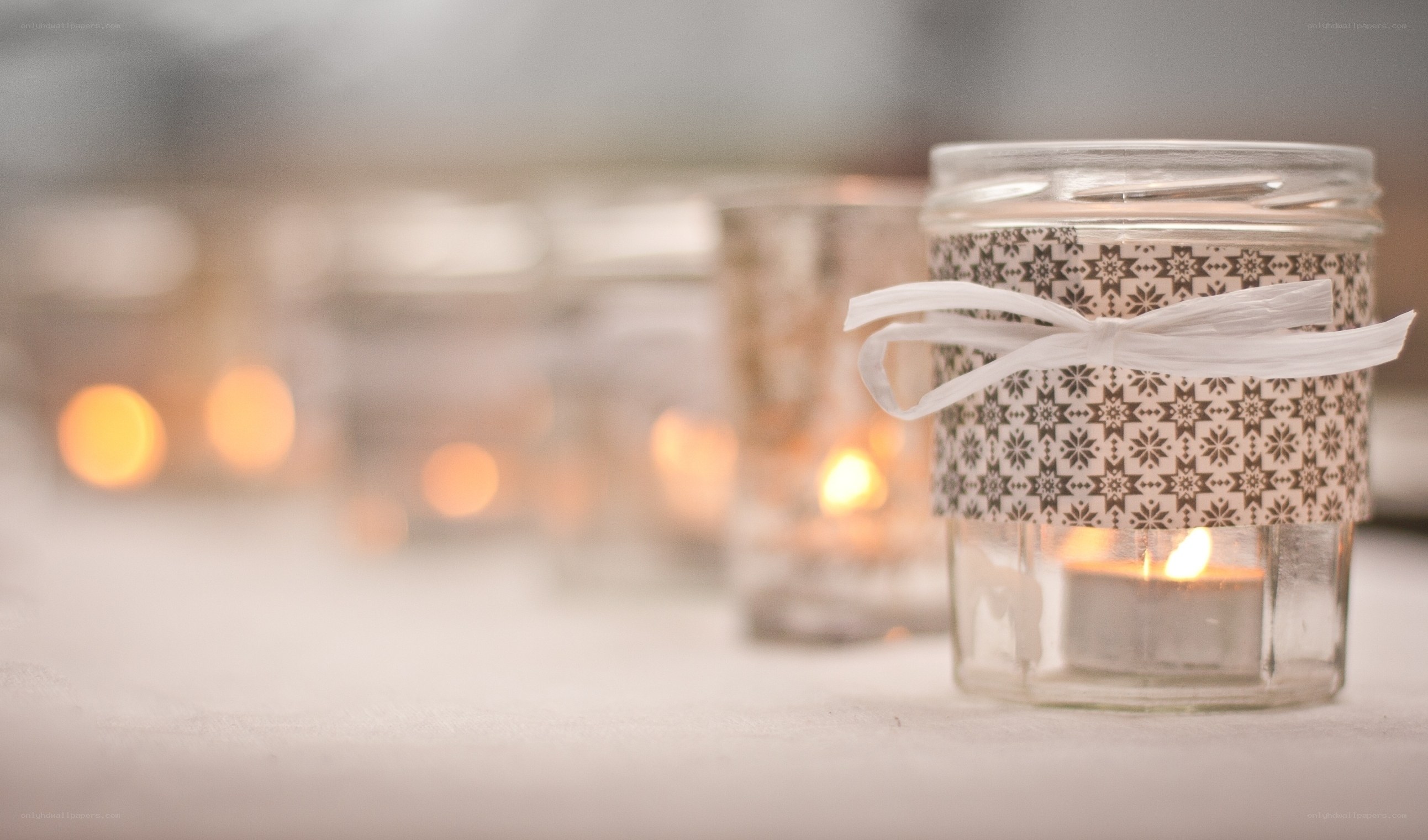 Candlelight in glass jars